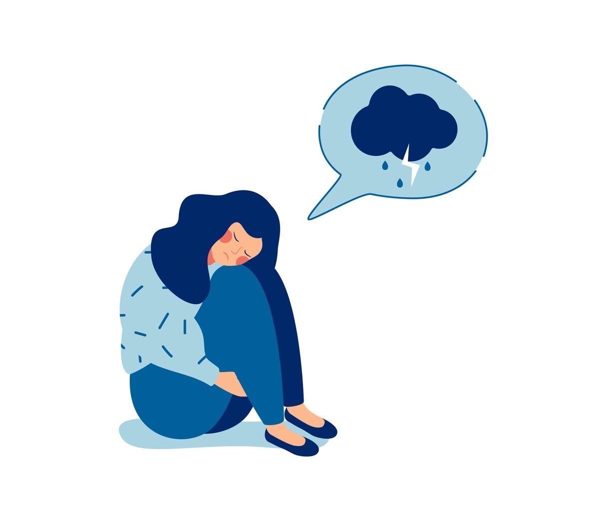 Illustration of woman hugging knees on floor upset due to poor mental health
