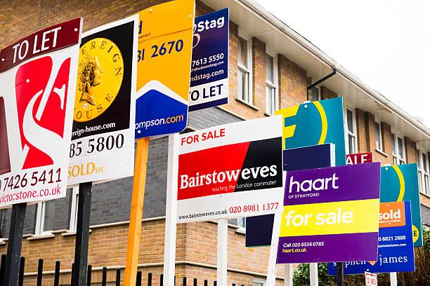 Image of lots of for sale signs