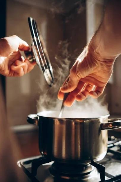Image of a pan boiling on a stove. Why millions of households can never seem to get ahead of their energy bills. Find out about the energy debt trap and ways to escape it