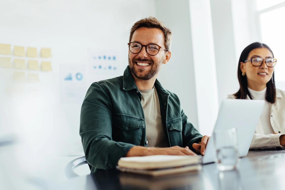 Two smiling office workers