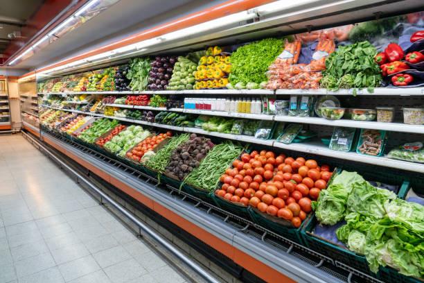 Image of shelves full of fruit and vegetables. Where to find the best Easter veg supermarket deals. Easter 2025 deals
