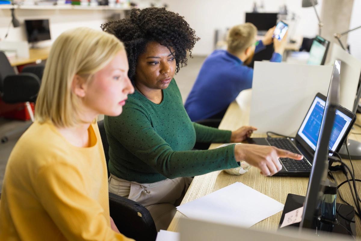 Two DWP employees viewing the bank account of a benefit claimant