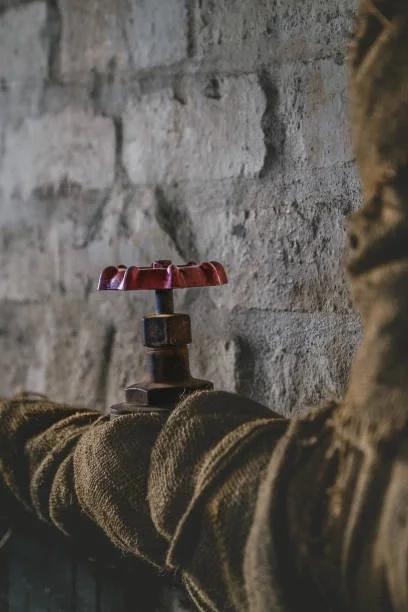 Image of a water pipe wrapped in insulation. Ways to protect your home and stay warm when temperatures drop to below zero