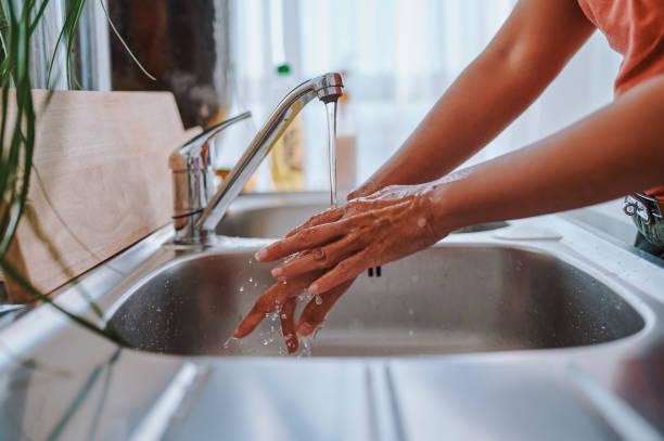 Image of someone washing their hands in a sink. Every water company’s hardship scheme – and how to get help with your bill. Where to get help if you're struggling with water bill rises. Water bill debt. Water bills increase by £123
