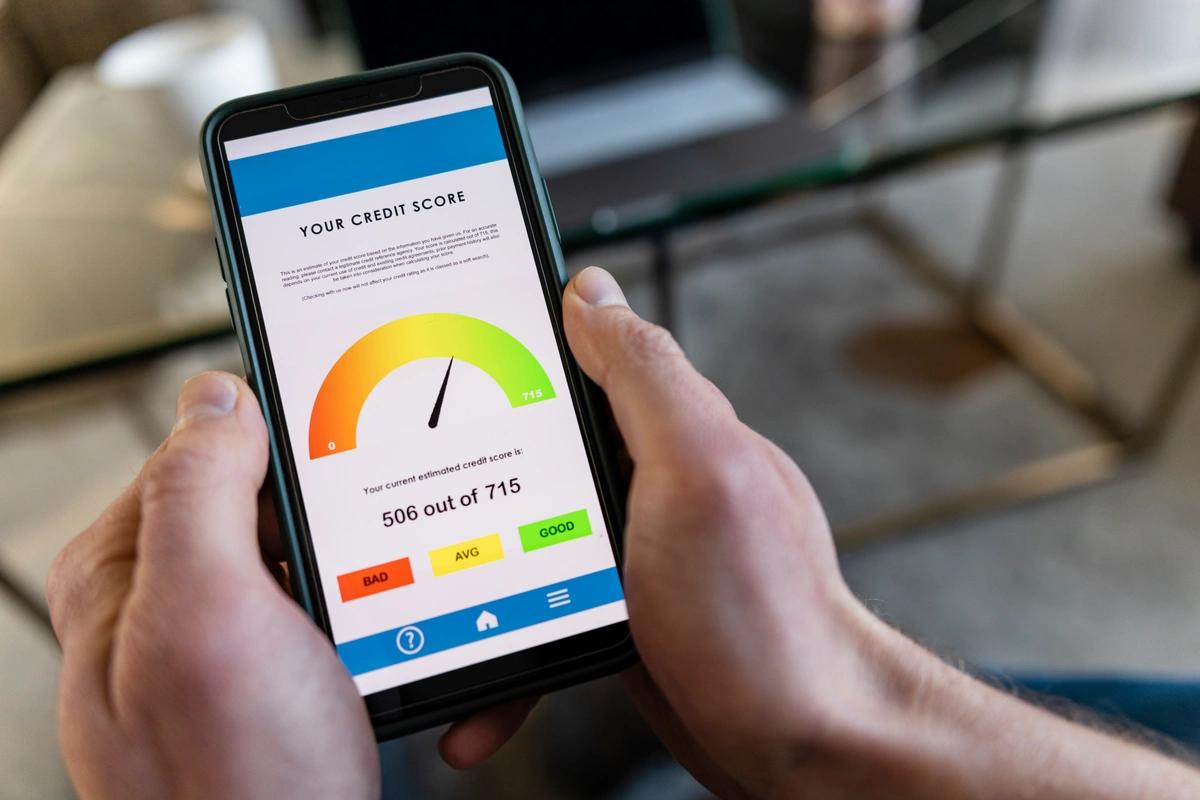 Someone checks their score on a free credit checker