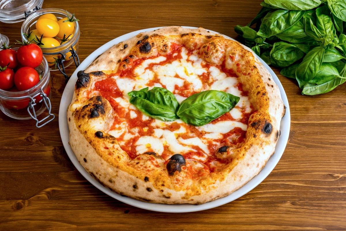 Image of a pizza. All the places to feed the kids for free Easter half term 2025