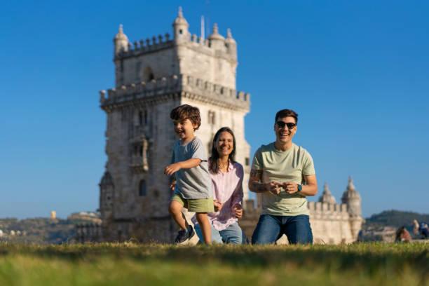 Image of a family on a day out at a castle. Free National Trust family pass - May 2025