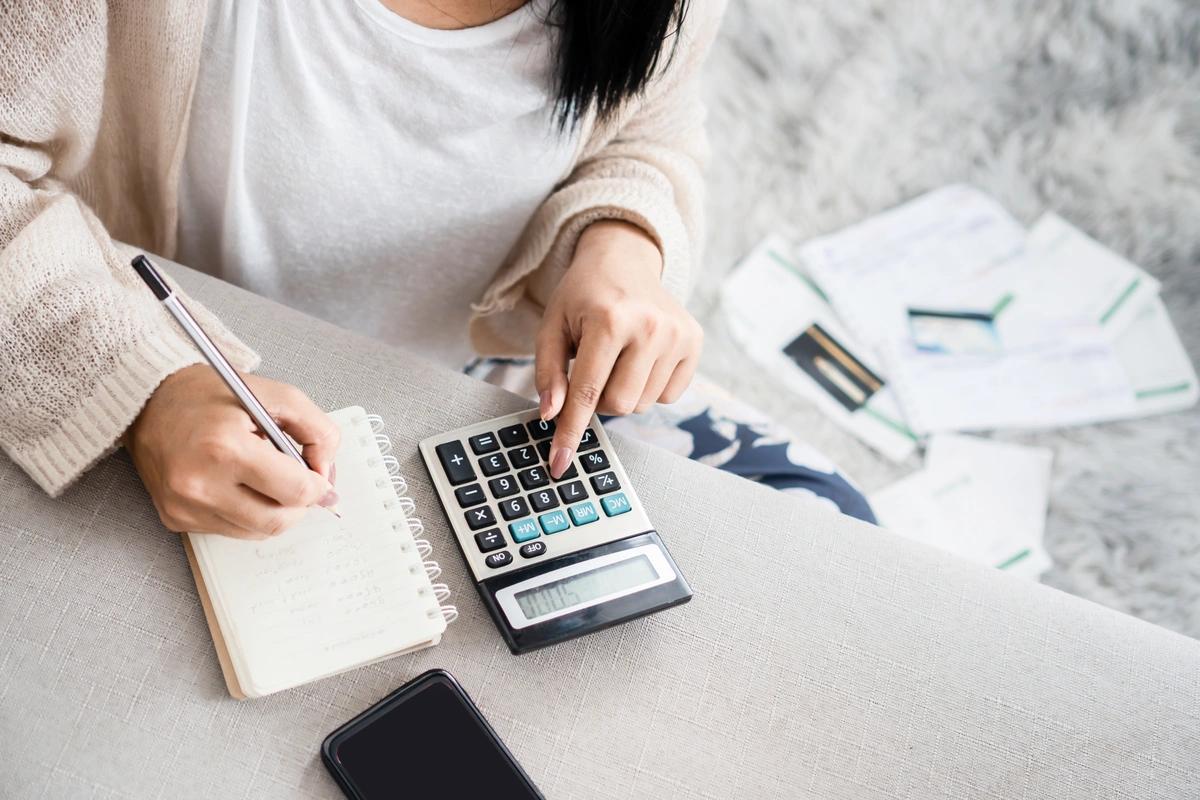 A woman works out her budget