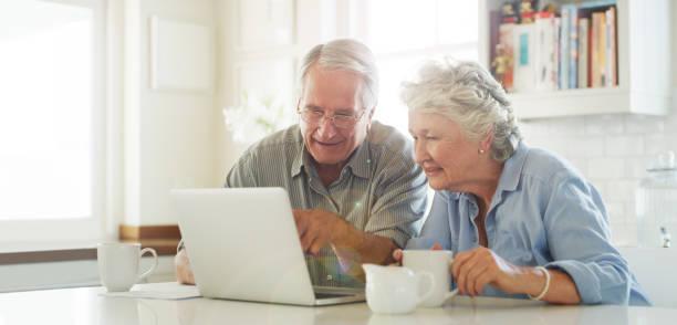 Image of two pensioners checking the government website