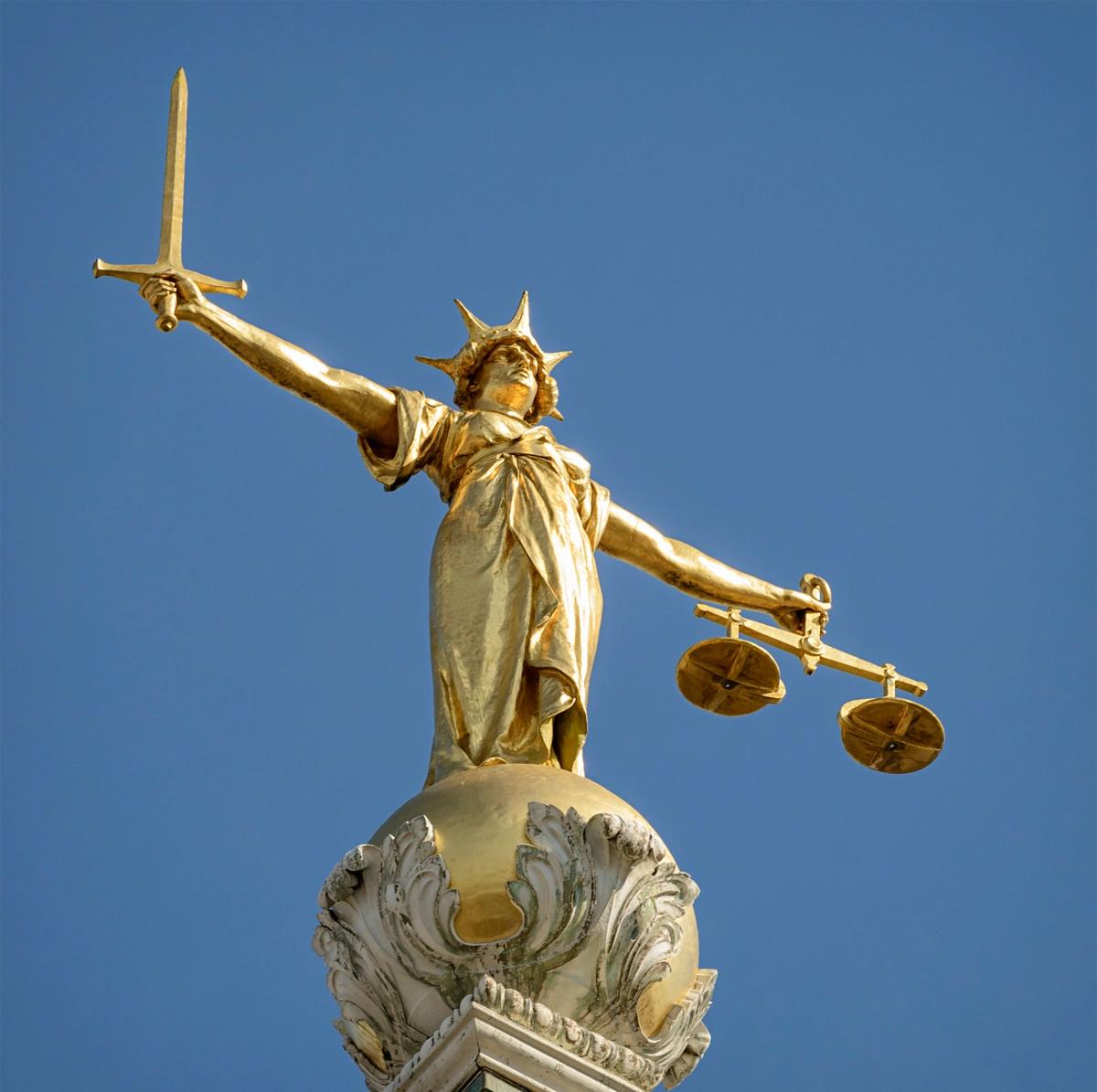 Lady Justice statue that stands on the dome of the Old Bailey in London