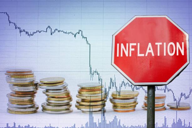 Image of a a falling graph with a stop sign that says inflation surrounded by pots of money