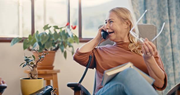 Image of someone speaking on a landline. Thousands of BT customers could be owed compensation