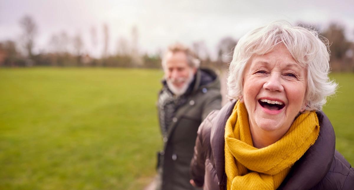 A retired couple out for a walk in the countryside