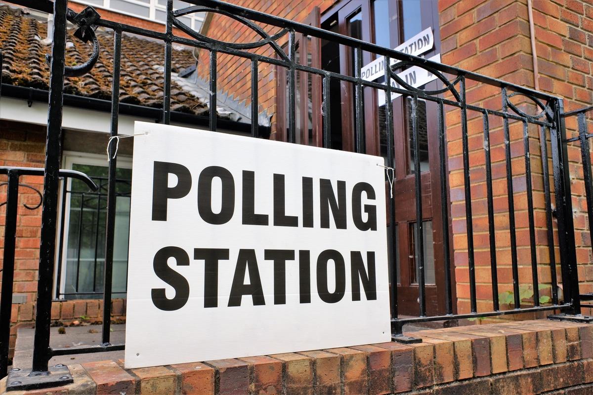 Polling station sign outside a church