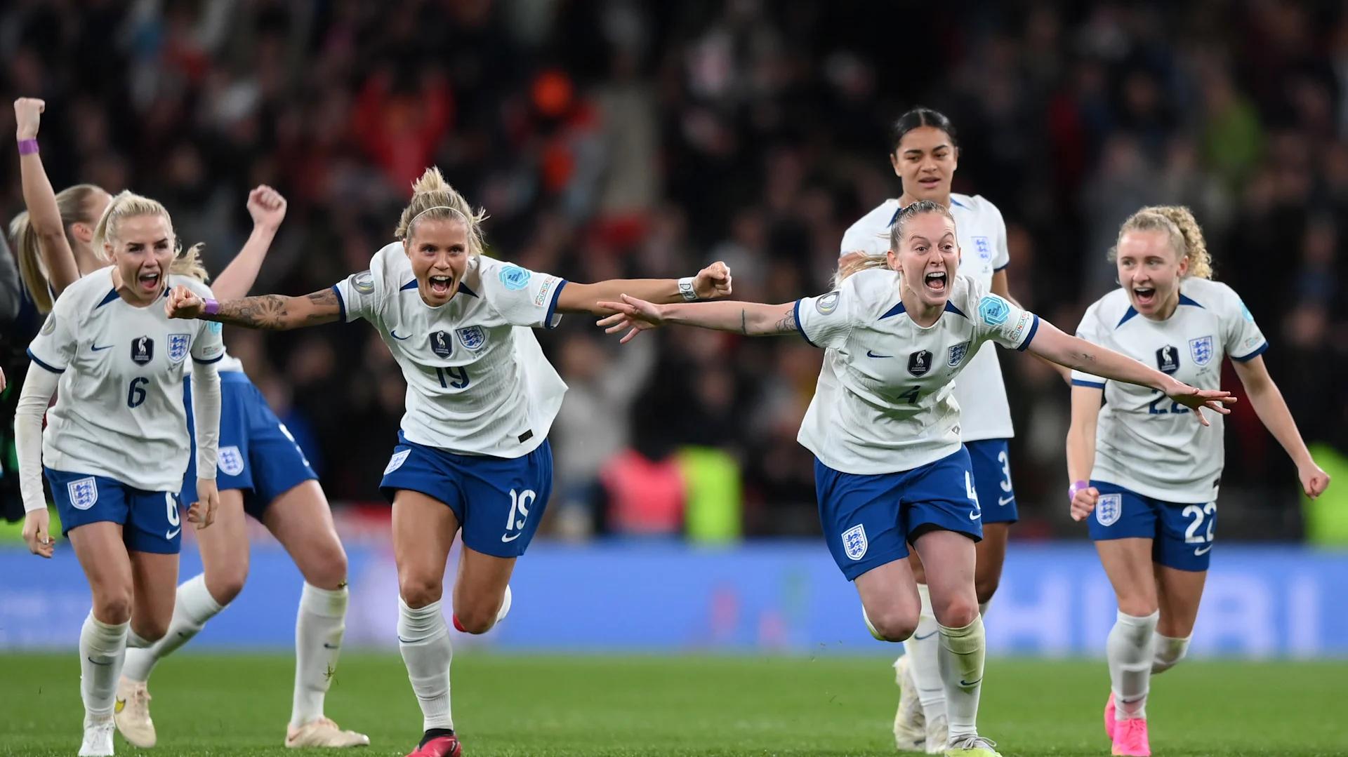 Image of England Women's football team celebrating after scoring a goal for England
