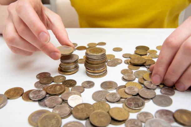 Image of someone counting money