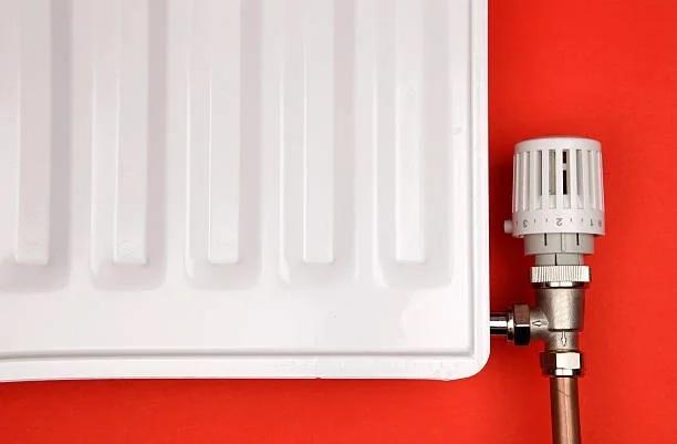 Image of a radiator with a thermostatic valve. Six gadgets under £20 that could save you hundreds on your energy bills