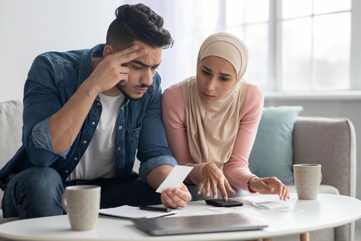 A young couple go through their finances