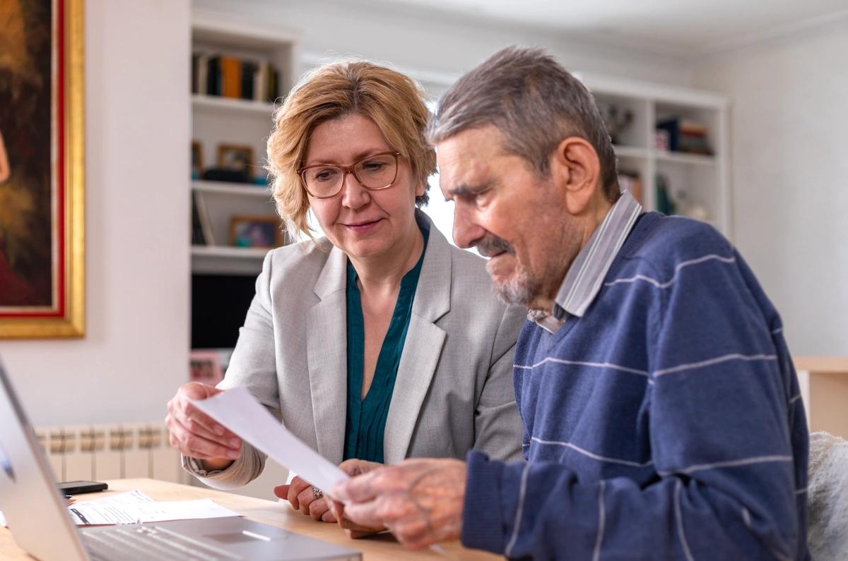 A couple looking over their will