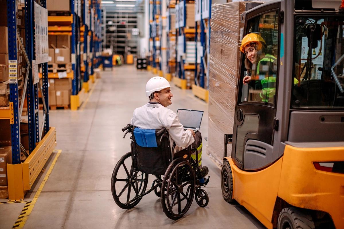 A disabled worker in a warehouse