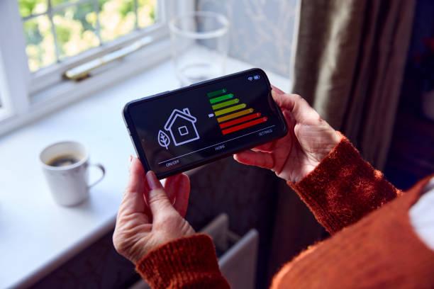 Image of a man holding a smart meter