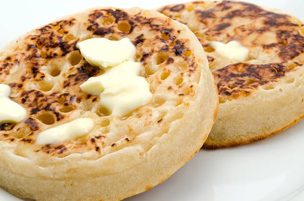 Image of two buttered crumpets