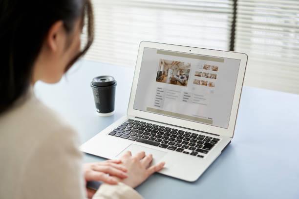 image of a lady working on her laptop