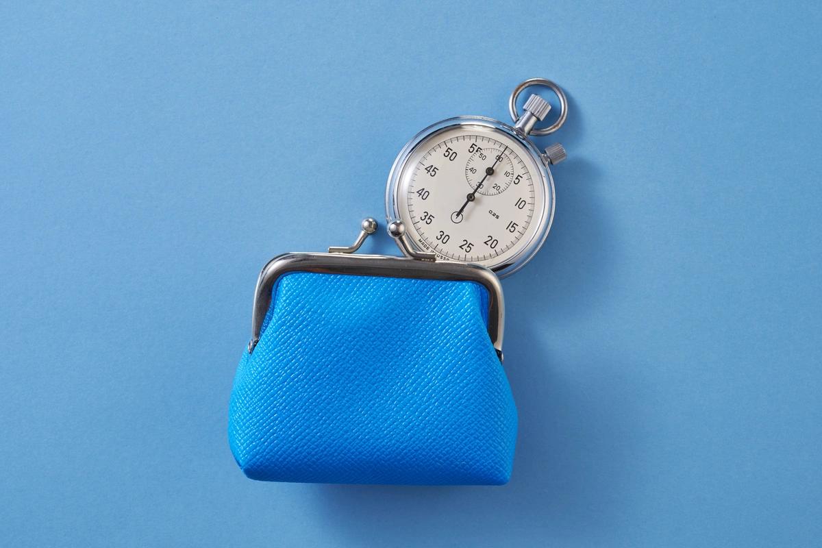 A purse and a stopwatch