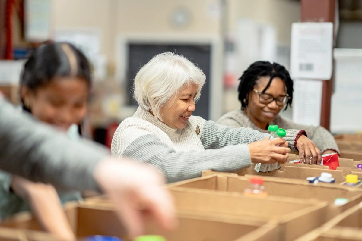 Food bank volunteers making up emergency food parcels