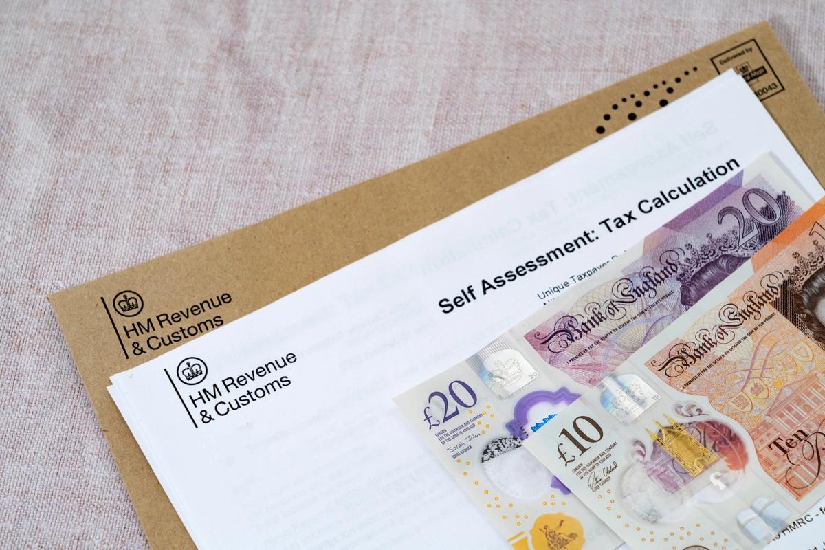 Self assessment letter and some bank notes