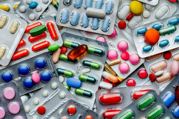 Image filled with lots of different tablets. 6 secret hacks that could cut your prescription . Find out how to save on over the counter medication and prescriptions bills by 70%