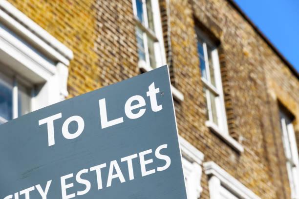 Image of a house with a to let sign outside