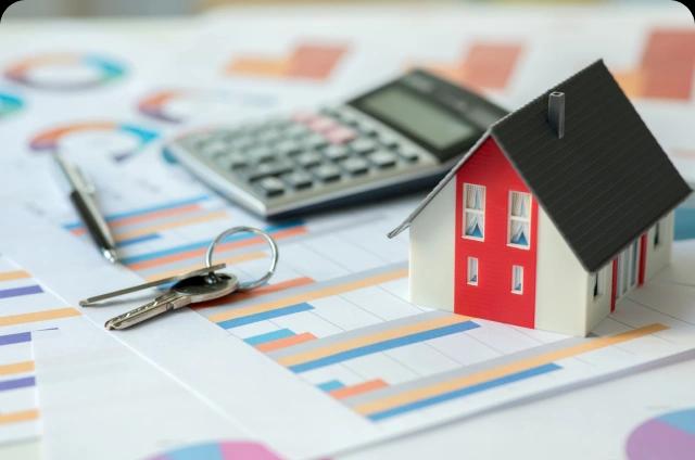 Miniature house keys and calculator
