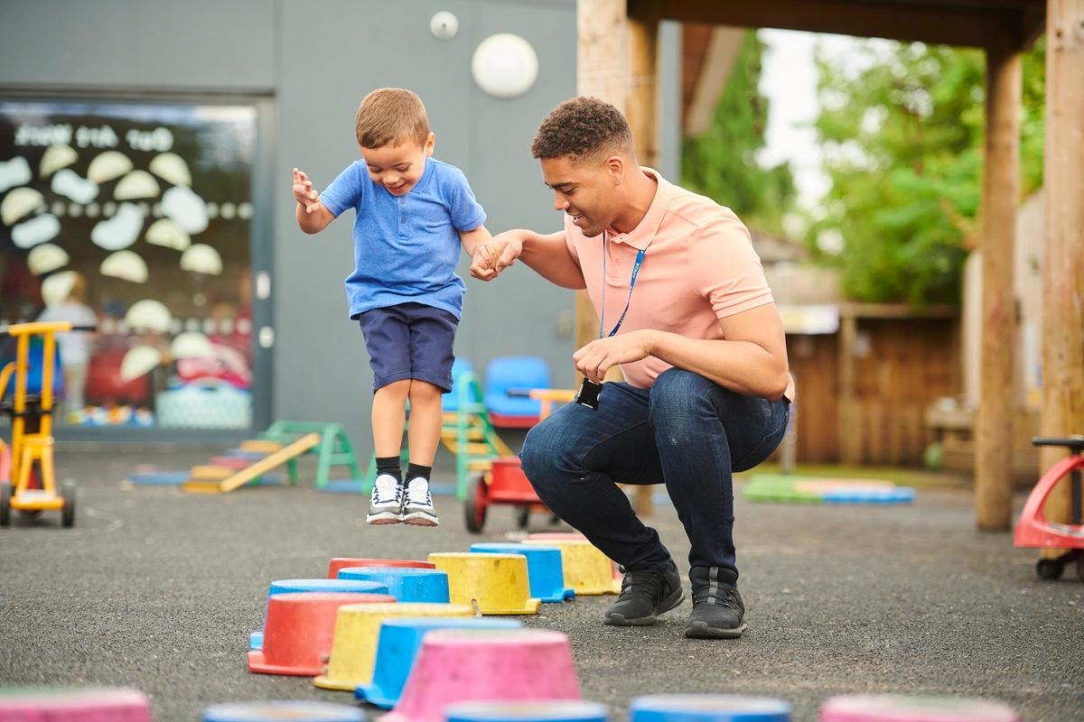 A boy playing at nursery