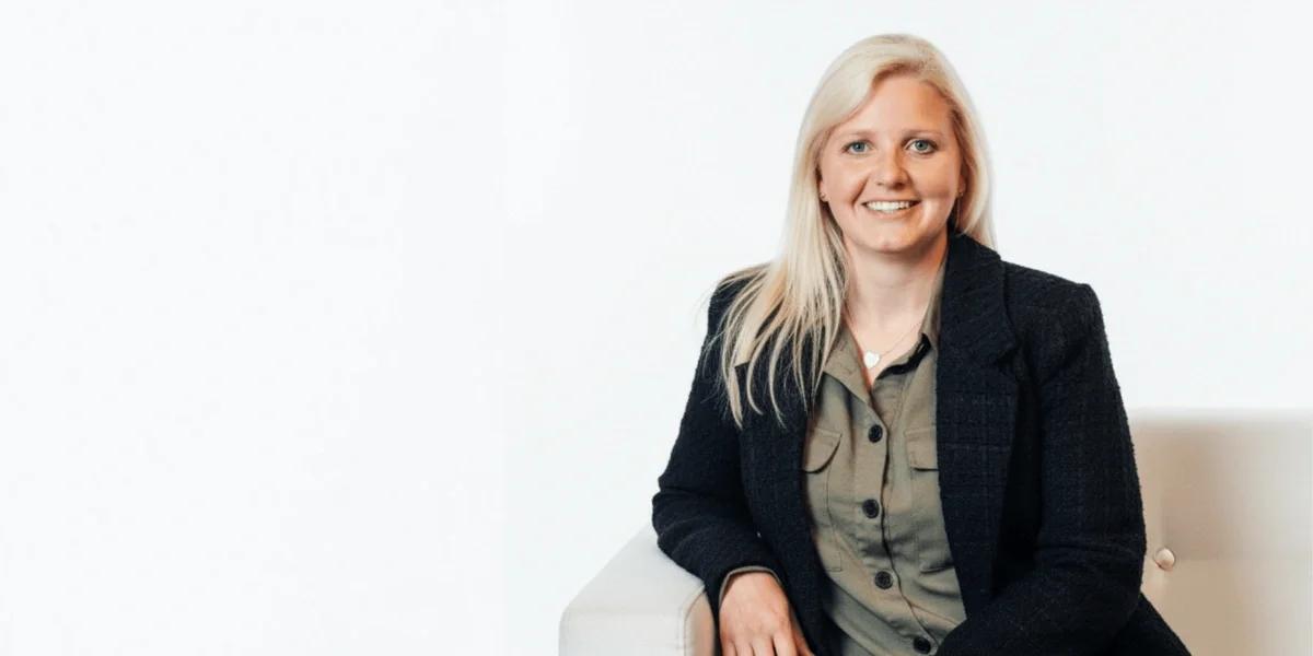 A headshot of Steph Ward, the evergreen queen