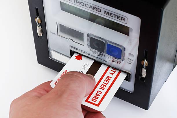 Image of a card being put into a prepayment meter