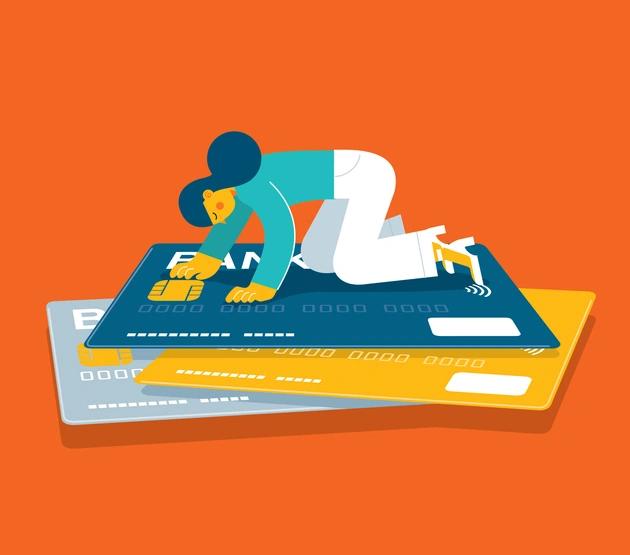 woman on top of credit cards, illustrated