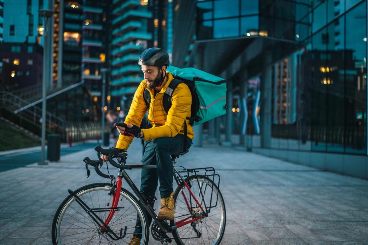 A delivery bike rider on a zero-hours contract