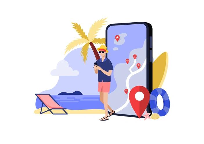 Man on beach holding phone with maps app open