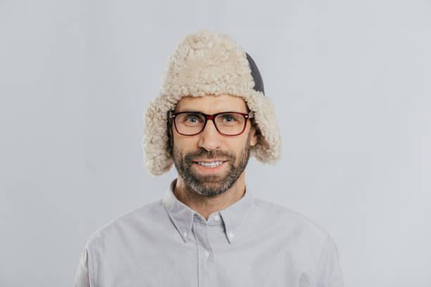 Image of a man with a woolly hat on