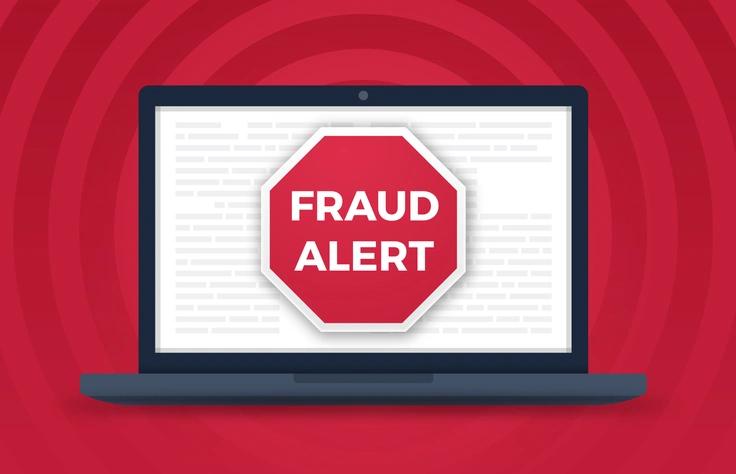 laptop that says fraud alert