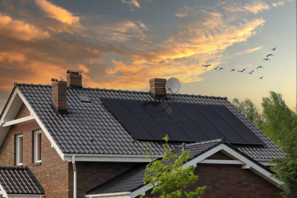 Image of a house with solar panels on the roof